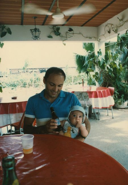 Papa holding baby Peter at Club Tachira
