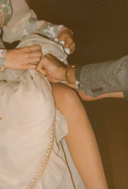 Garter at P&H wedding Bill Patsos putting it on Sandra Goranson
