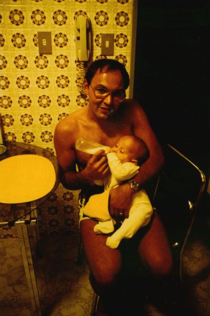 Paul and his baby daughter in our Bello Monte kitchen
