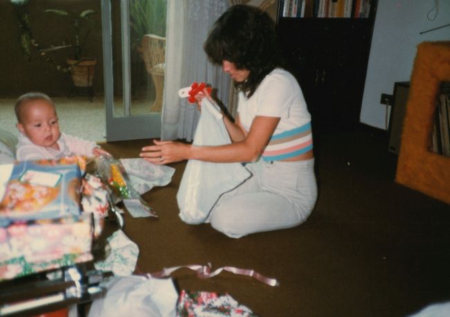 1983 Christmas: Jenny already likes Christmas presents
