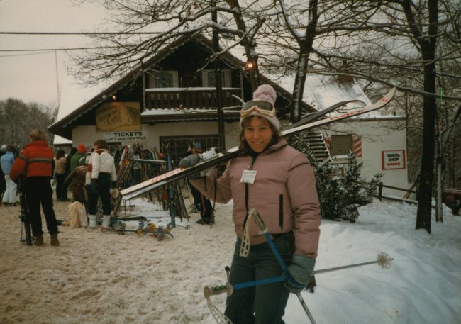 Leslie in front of lodge

