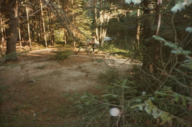 Helen at our homemade campsite on the Little Ossipee River 
