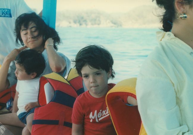 Alejandro's wife Betty, their son, our Peter and Veronica Barreiro (au pair) in boat somewhere in Mexican Pacific
