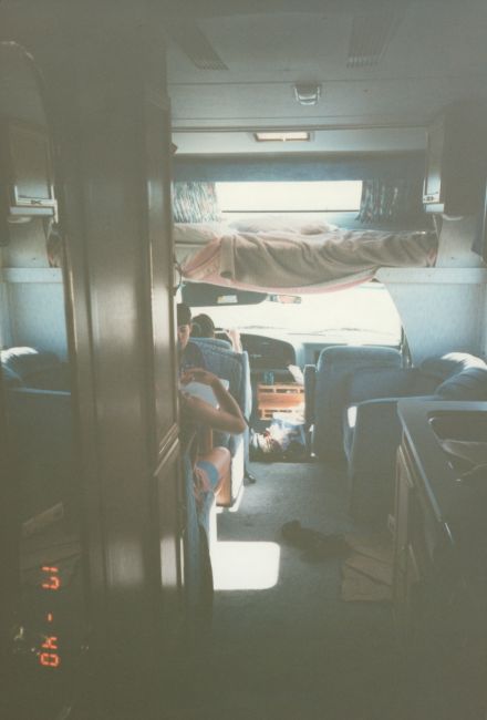 Jenny and Peter at table inside motorhome
