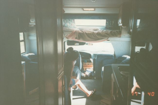 Helen inside our "Mini-Winnie"  Motorhome

