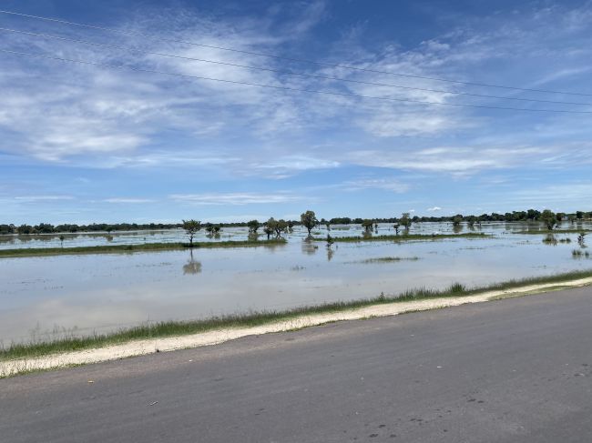 2/4/23.  In Angola, driving north from Namibia border. Recent heavy rains caused these floods.
