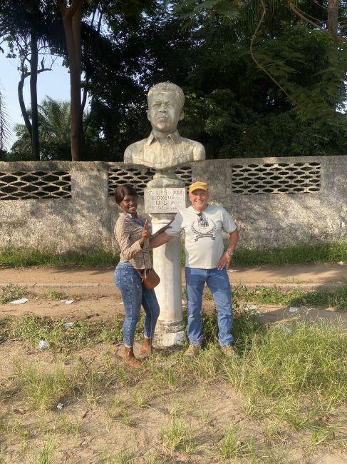 2/13/23 Marley and Paul during our walking tour of Brazzaville on an avenue busts of famous 3rd world heroes: Muhammed Ali
