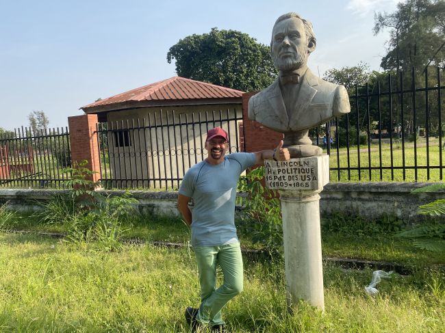 2/13/23 Ray during our walking tour of Brazzaville on an avenue busts of famous 3rd world heroes: Abraham Lincoln
