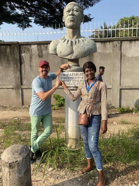 2/13/23 Ray and Marley during our walking tour of Brazzaville on an avenue busts of famous 3rd world heroes
