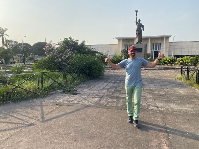 2/13/23 Ray in front of the abandoned central train station in Brazzaville.  During colonial times, there was a fully functional railroad reaching many parts of the country.  All gone now.
