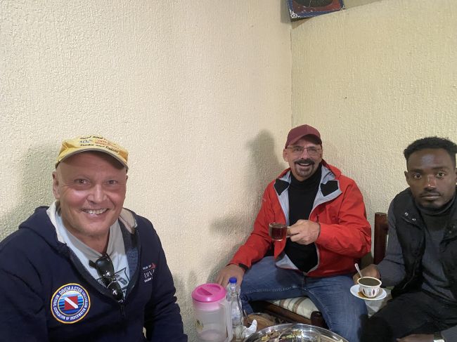 12/19/23 Paul, Ray and Guide eating lunch during tour of Addis Ababa
