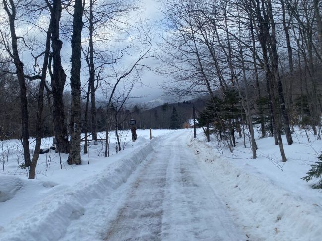 long walk through plowed farm road from parking area to actual start of trail

