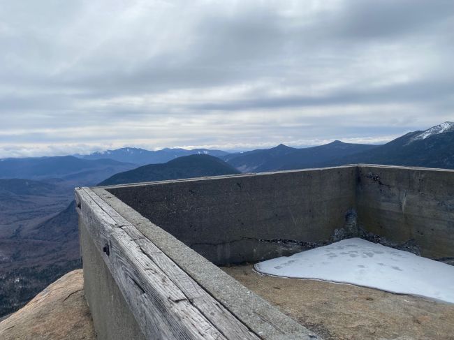 Foundation of former fire tower visible.   View to the south (Loon upper trails visible?)
