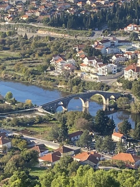 Looking down at medieval bridge from orthodox church  in Trebinje, Bosnia and Herzegovina
