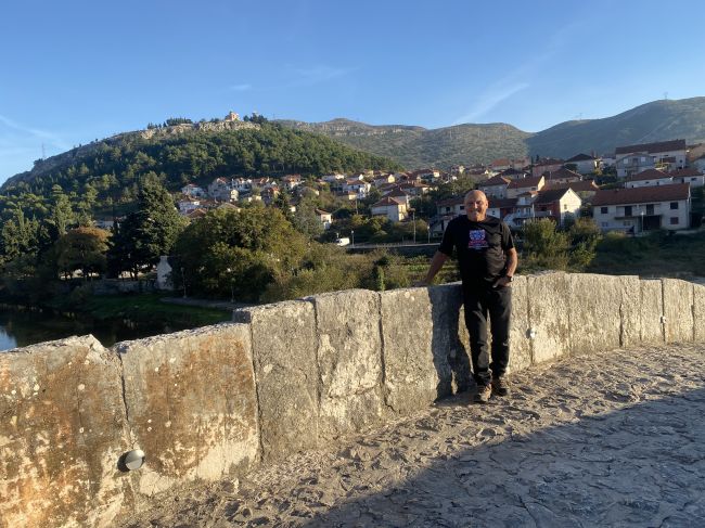 Paul on medieval bridge in Trebinje, Bosnia and Herzegovina
