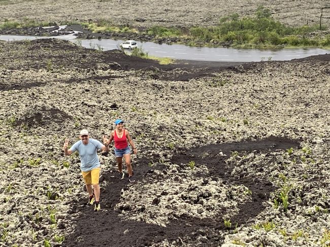 Ray and Kig walking up old lava flow on south part of Reunion Island
