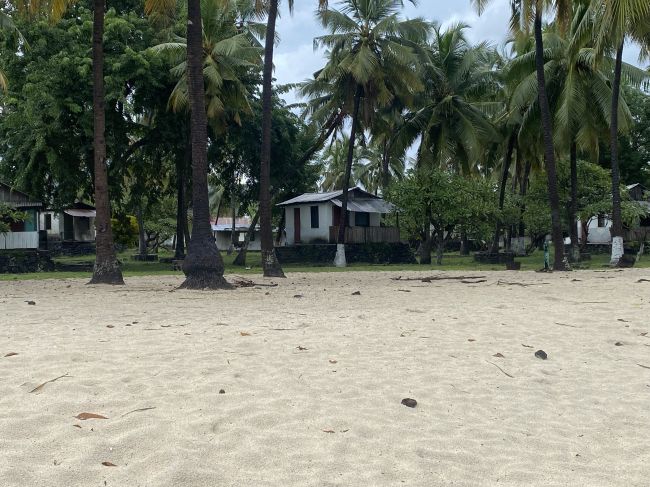 Ruins of Comoros government failed attempt at developing beach tourism; abandoned bungalows
