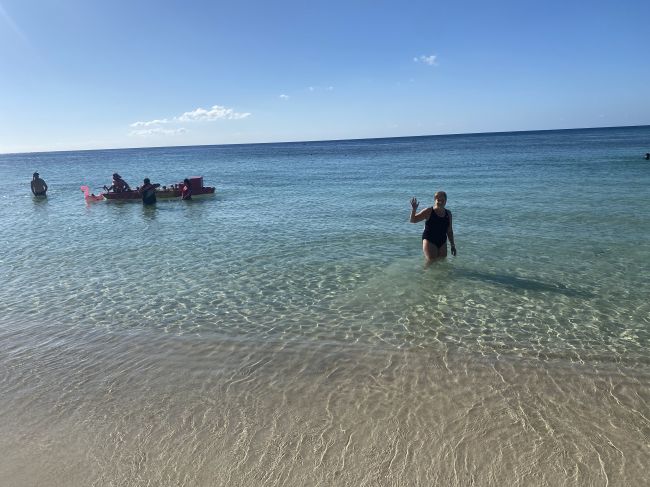 2/14 Helen swimming on West End beach in Roatan
