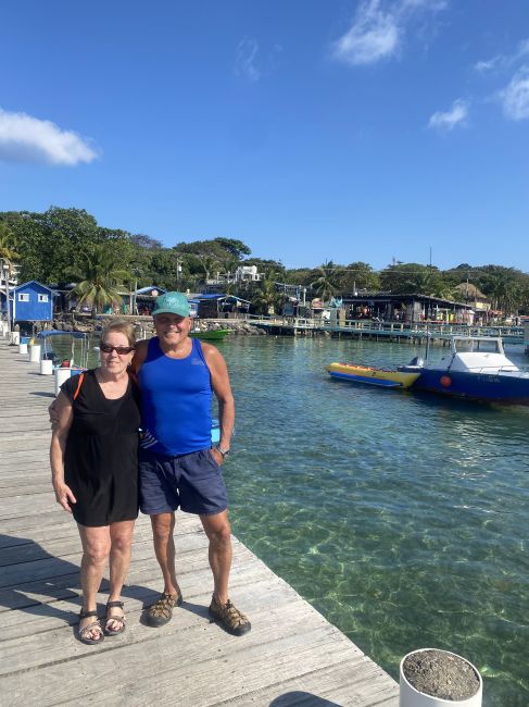 2/17 Paul and Helen waiting for the water taxi in Roatan
