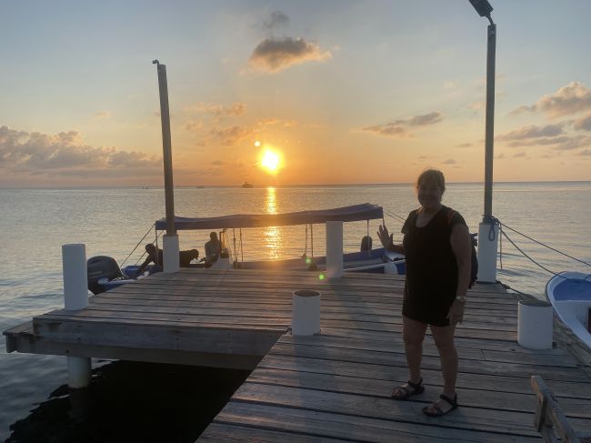 2/17 Helen waiting for the water taxi in Roatan
