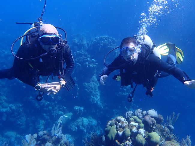 2/15 Bill Johnson and Paul diving in Roatan, Honduras
