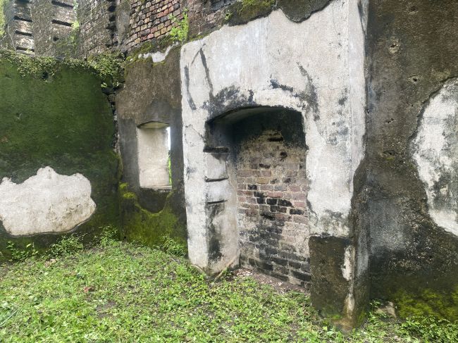 9/23/26 Bunce Island Slave Holding fort, upriver from Freetown, Sierre Leone - fireplace where branding irons were heated.
