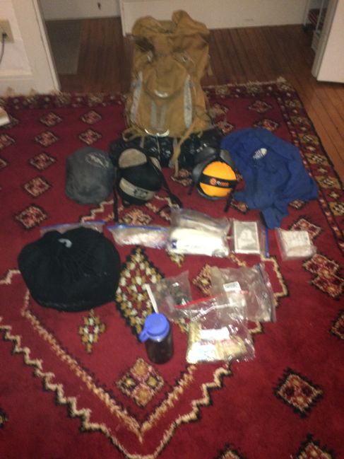 bottom of main pack (clothes, sleeping bag, thermarest)

