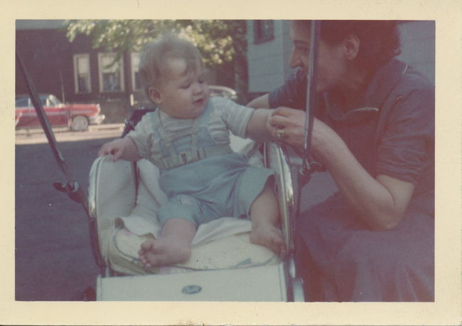 Greta Holman and grandson Chris Holman in Adamson St. driveway
