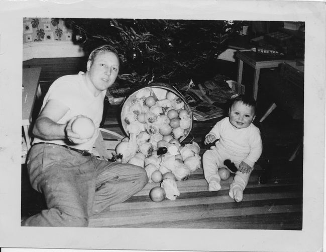 Ake and Paul Niel in 3rd floor Allston apartment ca 1955 at Xmas
