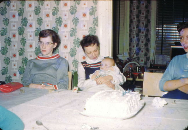 Rosalie, Greta, baby Paul, and ?? in Allton dining room 1954
