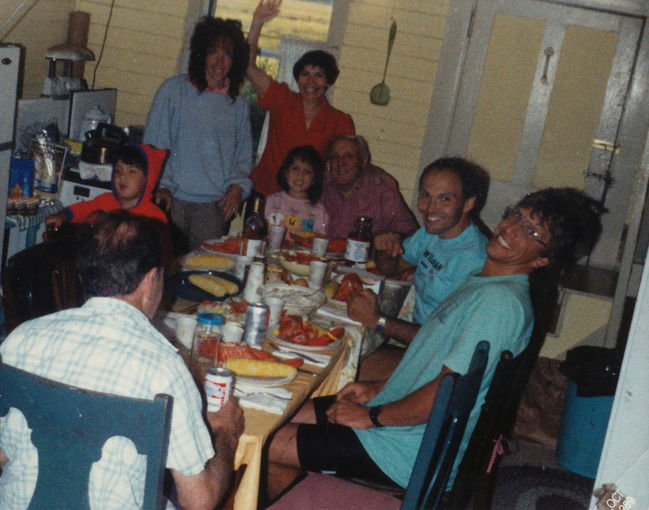 Wells Beach Kitchen after 1rst Wildman Biathlon Aug. 1989. From Rt: Ed Goggin, Paul, Ake, Jenny, Lynn, Helen, Peter, Uncle Paul
