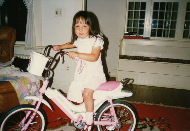 Jenny's new 6th birthday bike, Eliot living room
