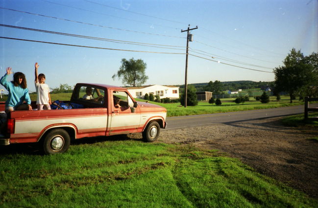 Early pickup ca 1994 Carlos driving, Helen and Jenny in bed
