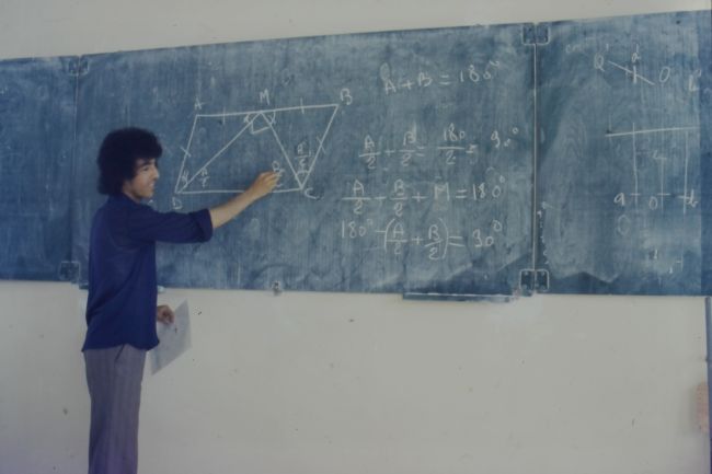 one of our students working on a geometry problem on the board
