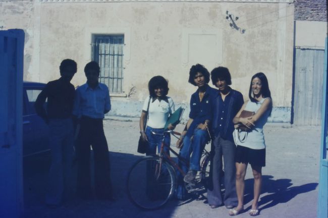 Helen with a group of our students.  Note the non-traditional Muslim dress of one of the females.  Many of the secretaries who worked in our school dressed Western during the day but went home fully covered in white
