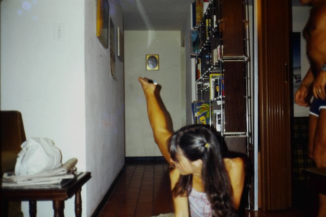 6 mos pregnant Helen doing leg lifts in our F.A. apartment
