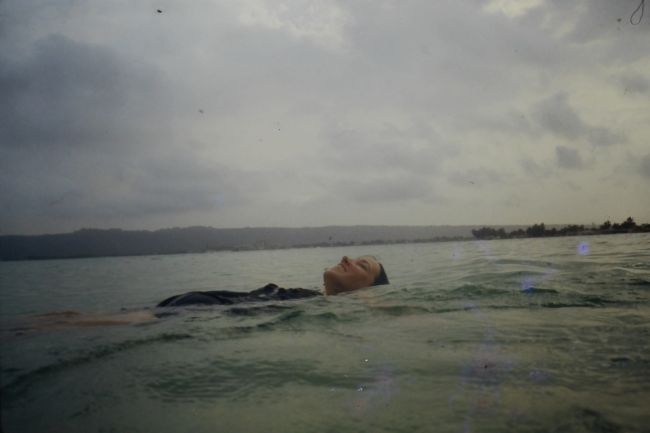 Helen with Jenny inside floating easily
