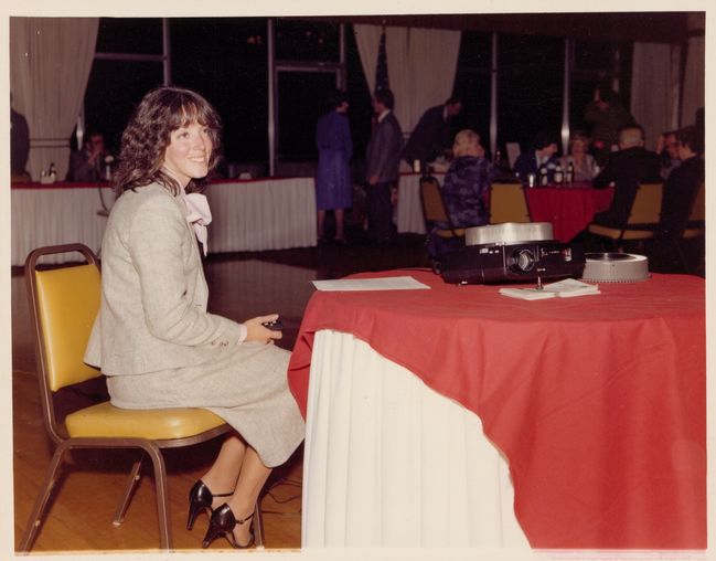 Helen at Lyon's club presentation of P&H 1981 cross-country bicycle trip in Canton Ma
