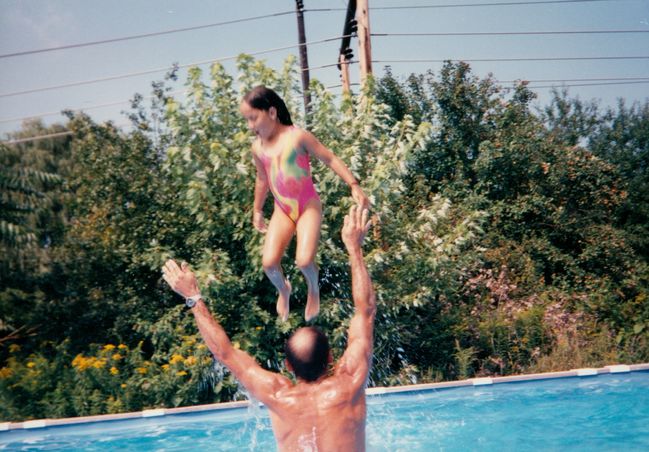 Paul doing Kunta Kinte with Jenny at Papp's pool
