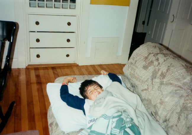 Peter napping the living room couch in Eliot
