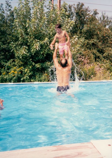 Paul doing the classic 'Kunta kinte' move with Peter at Chip and Shirley's pool early 1990s
